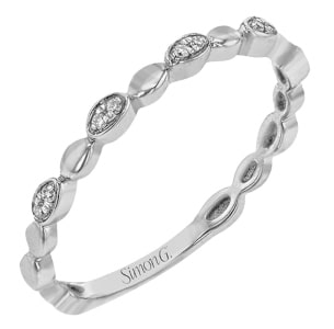 This 14k white gold Simon G fashion ring features a streamlined, beading silhoutte