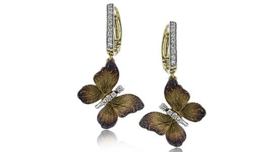 A pair of butterfly motif earrings with diamond accents by Simon G.